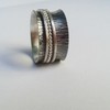 Tiny 20161123133902 87240fc3 spinner ring cheiropoiito