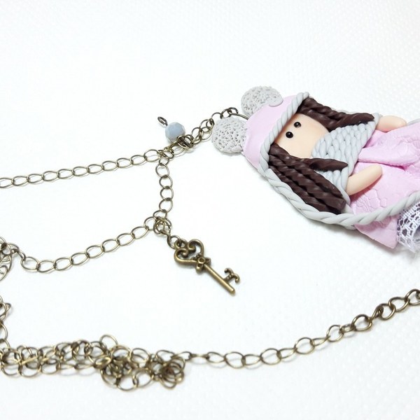 Pink doll necklace