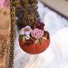 Tiny 20230915192100 42112ace floral pumpkin necklace